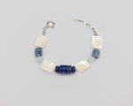 Load image into Gallery viewer, Bracciale in Lapislazzuli, Distene, Quarzo celeste e Madreperla
