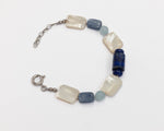 Load image into Gallery viewer, Bracciale in Lapislazzuli, Distene, Quarzo celeste e Madreperla
