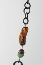 Carica l'immagine nel visualizzatore di Gallery, Collana in corno nero, turchese tibetano, crisoprasio, ambra, citrino e pietra lavica
