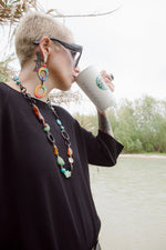 Carica l'immagine nel visualizzatore di Gallery, Collana in corno nero, turchese tibetano, crisoprasio, ambra, citrino e pietra lavica
