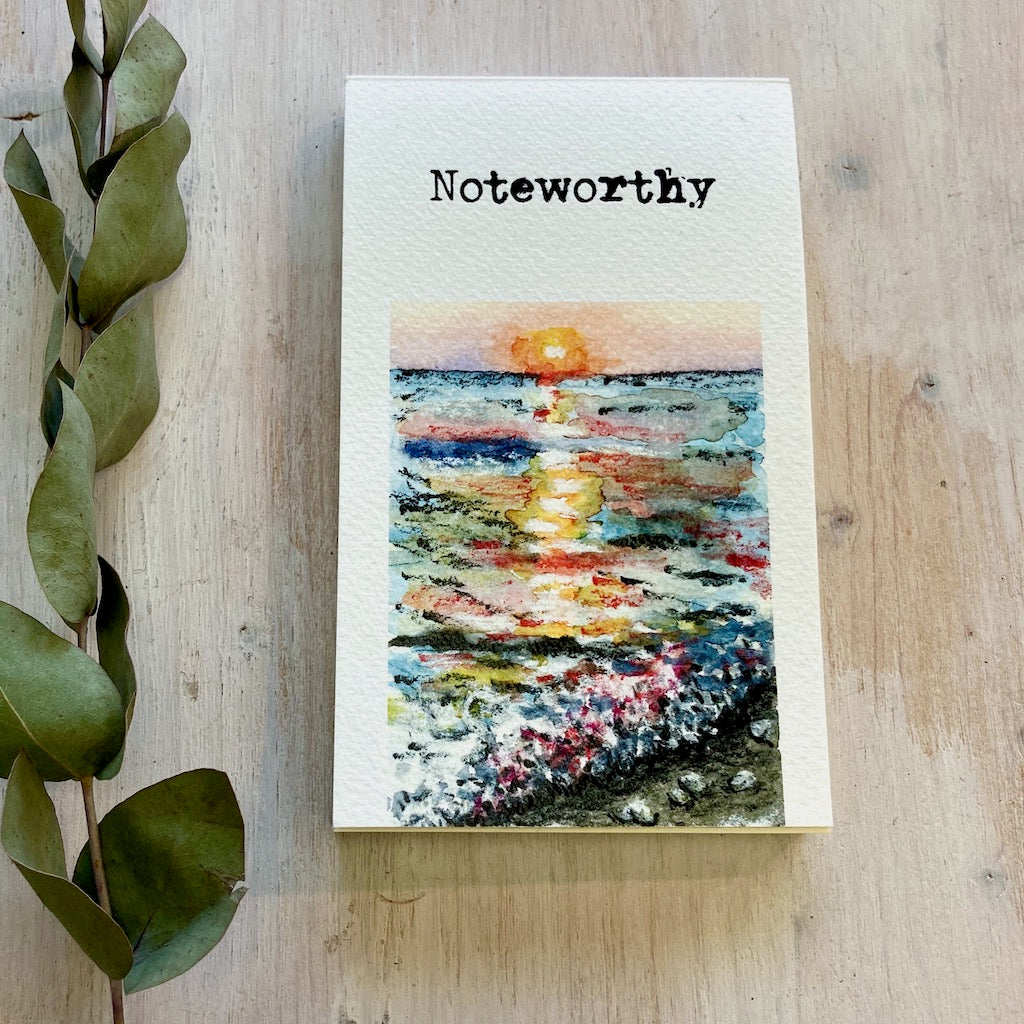 "Sunrise over the sea" Noteworthy Notepad